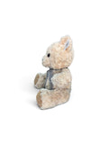 Peluche El Mundo De Sofia Beige Sentado Con Moño Cuadrado